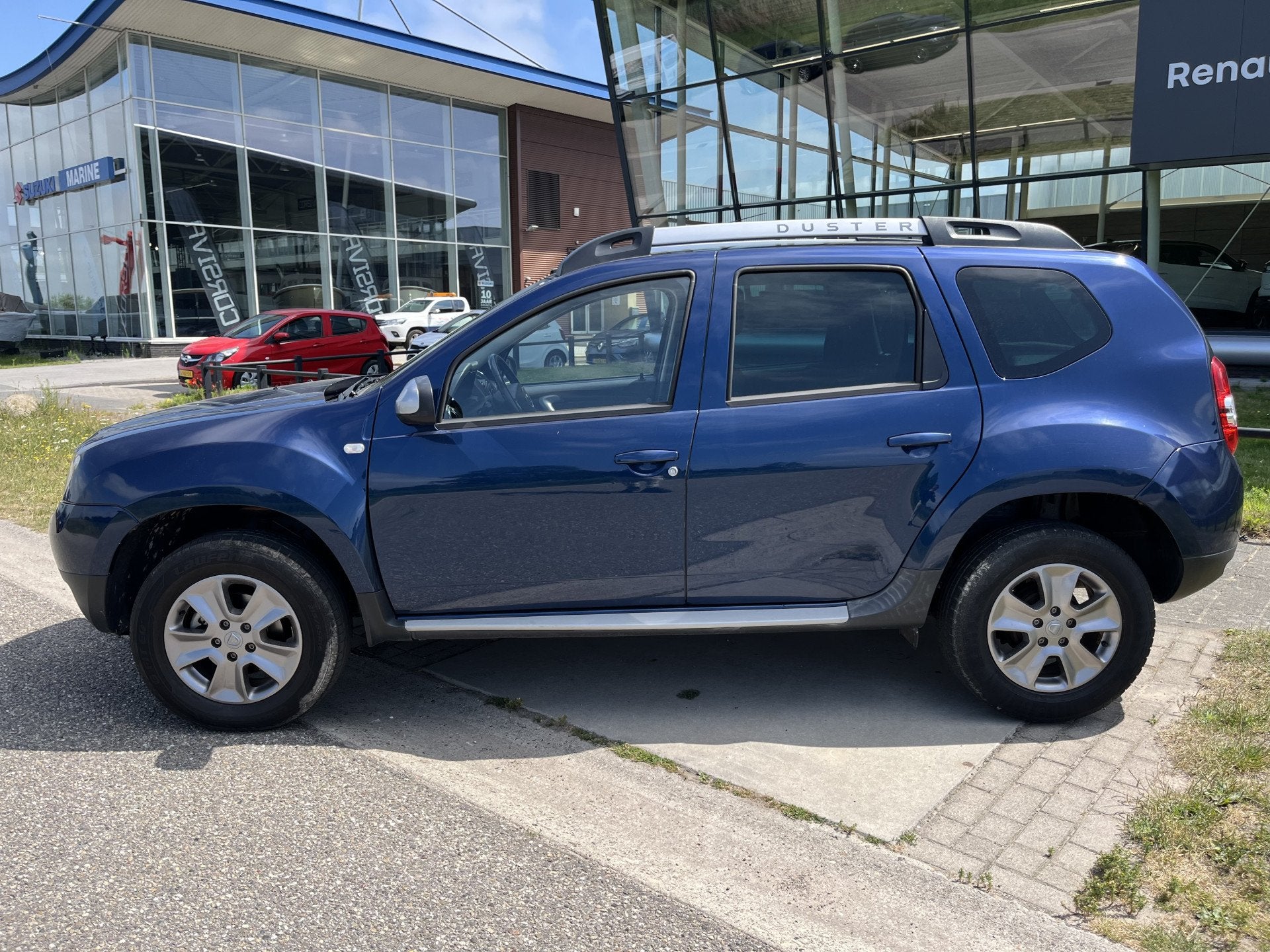 Dacia Duster 1.2 TCe 4x2 Prestige 126PK / Trekhaak / Airco /, Auto's, Stof, Gebruikt, Bedrijf, Handgeschakeld
