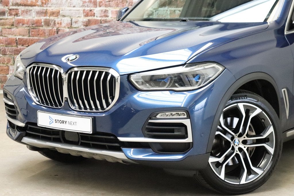 BMW X5 xDrive40i High Executive xLine Automaat / Live Cockpi, Auto's, BMW, Gebruikt, Blauw, 340 pk, Bedrijf