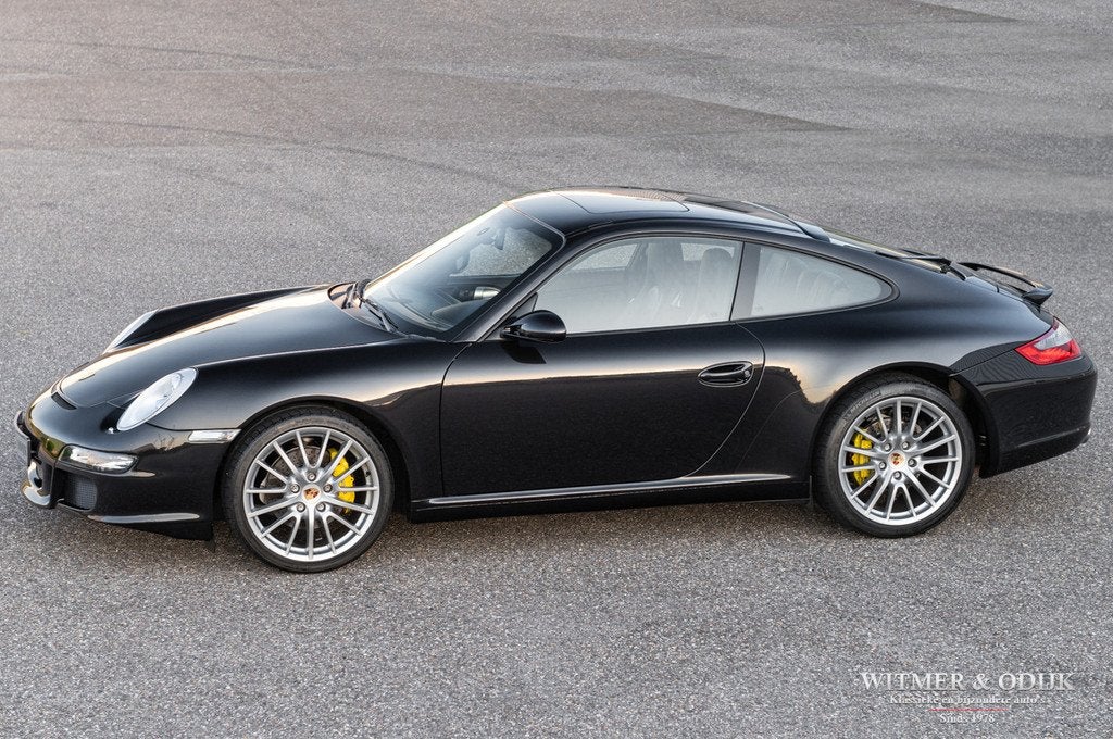 Porsche 911 Carrera Nieuw PCCM (bj 2004, automaat), Auto's, Porsche, Automaat, Achterwielaandrijving, Gebruikt, Zwart