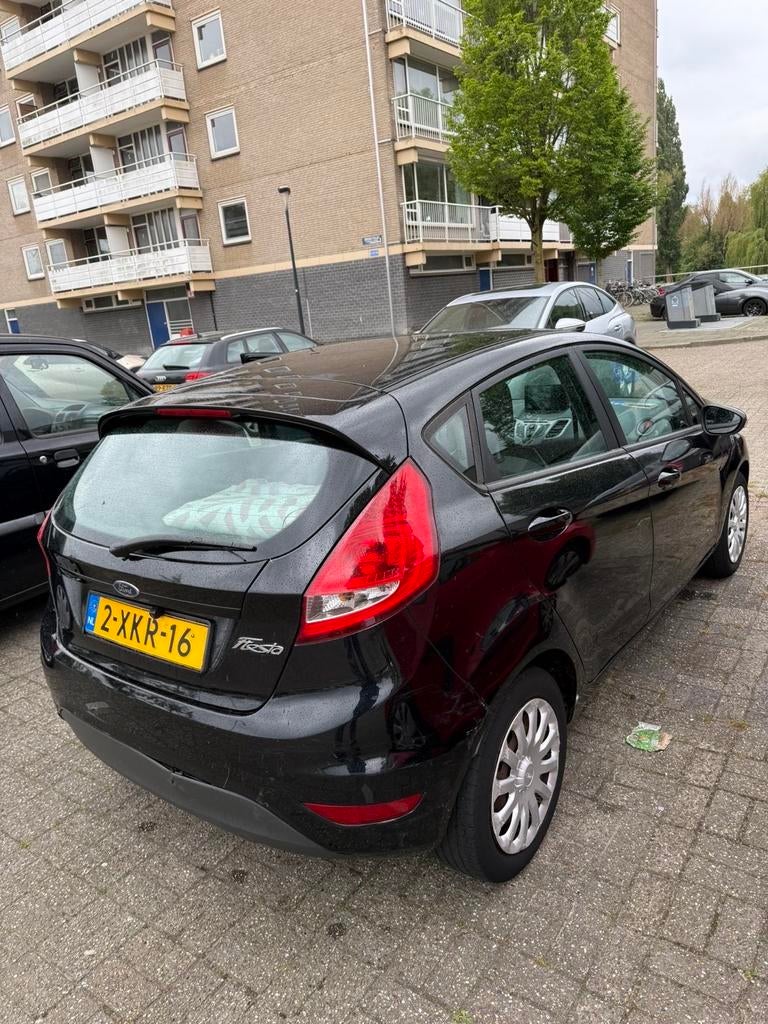 Ford Fiësta 1.25 60KW 5DR 2010 Zwart, Auto's, Voorwielaandrijving, 1242 cc, Zwart, Handgeschakeld
