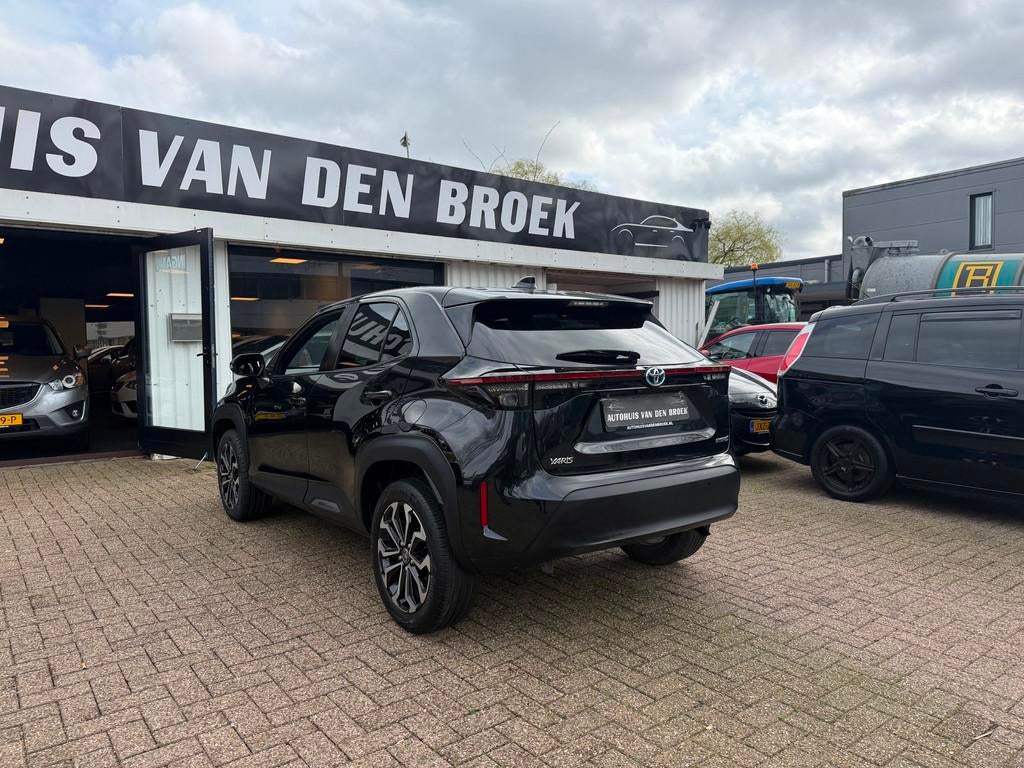 Toyota Yaris Cross 1.5 Hybrid First Edition|Navi|Cruise|Clim, Auto's, Toyota, Gebruikt, Zwart, Bedrijf, 93 pk
