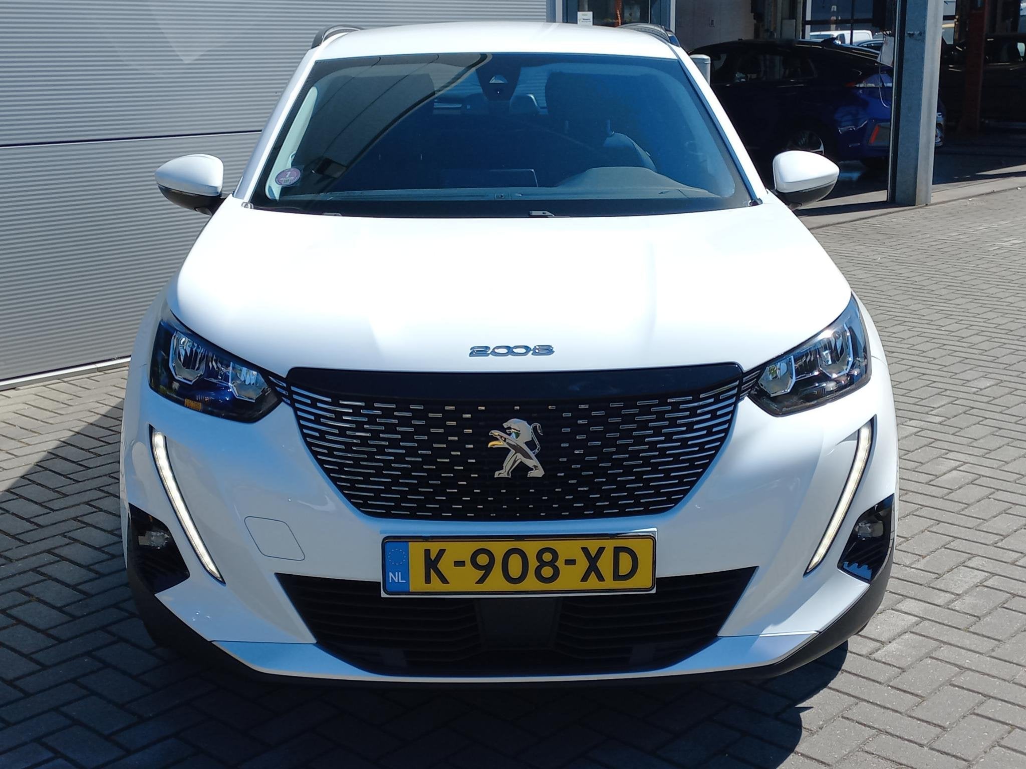 Peugeot 2008 1.2T 100pk Allure Pack | Climate control | Navi, Gebruikt, Euro 6, 1199 cc, Leder en Stof