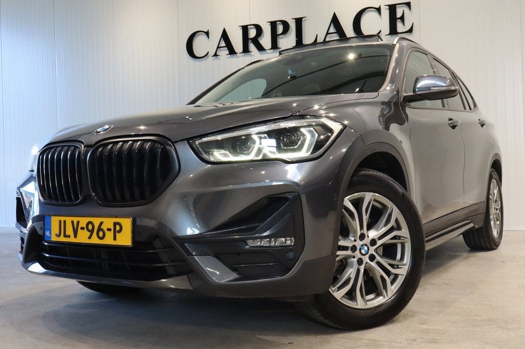 BMW X1 SDrive18i High Executive-Panoramadak-Automaat, 136 pk, Gebruikt, Euro 6, Leder en Stof