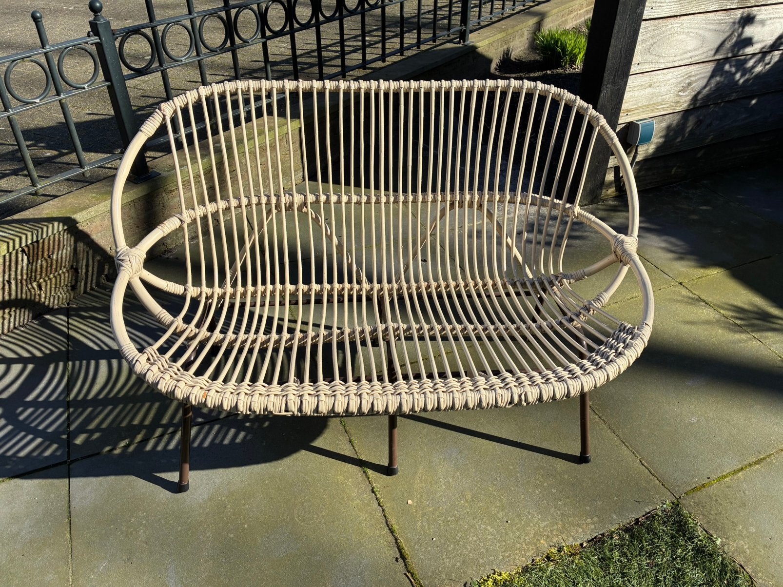 Retro rotan bankje, Ophalen