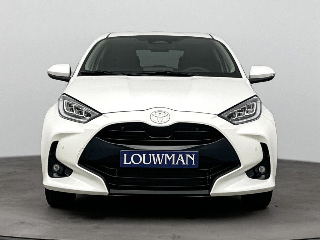 Toyota Yaris 1.5 Hybrid 115 Dynamic Comfort Pack Nu te BESTE, Auto's, 12 maanden, Stof, Zwart, 116 pk