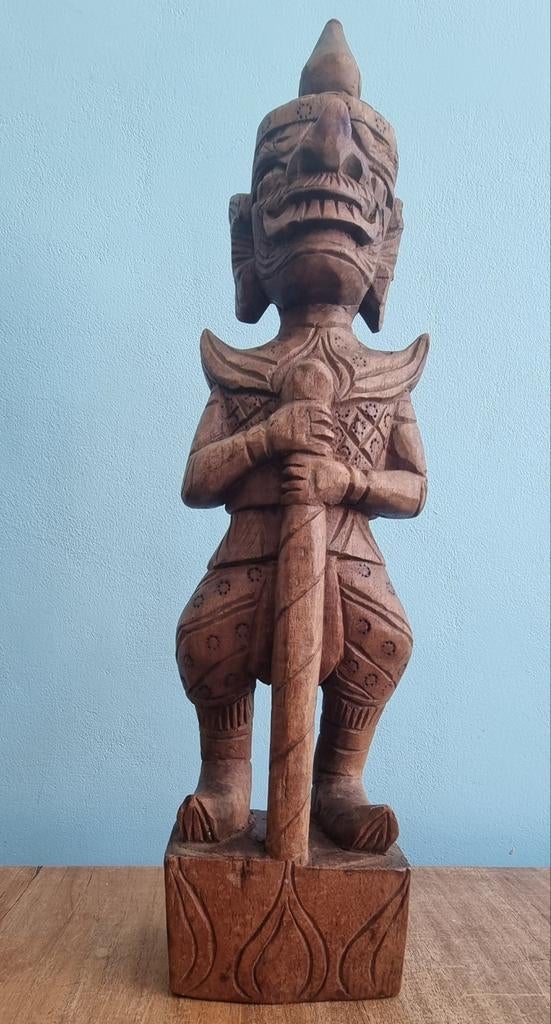 Houten beeldje, Ophalen