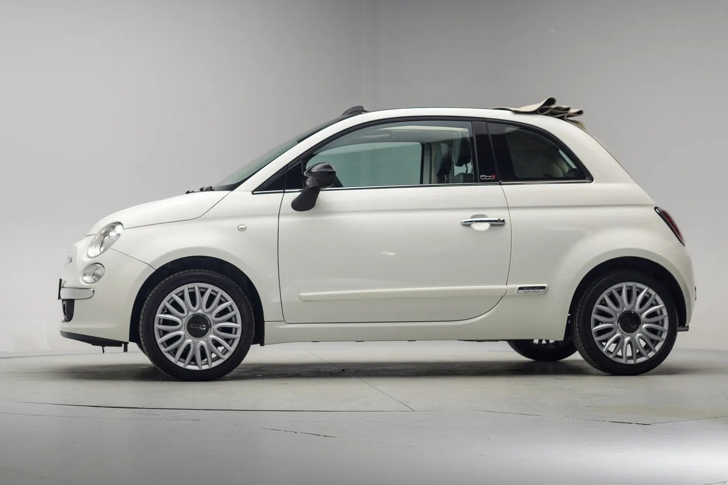Fiat 500C 1.2 Lounge Cabrio [ Leer Climate Navi PDC Lichtmet, Auto's, 21 km/l, Gebruikt, 4 cilinders, Cabriolet