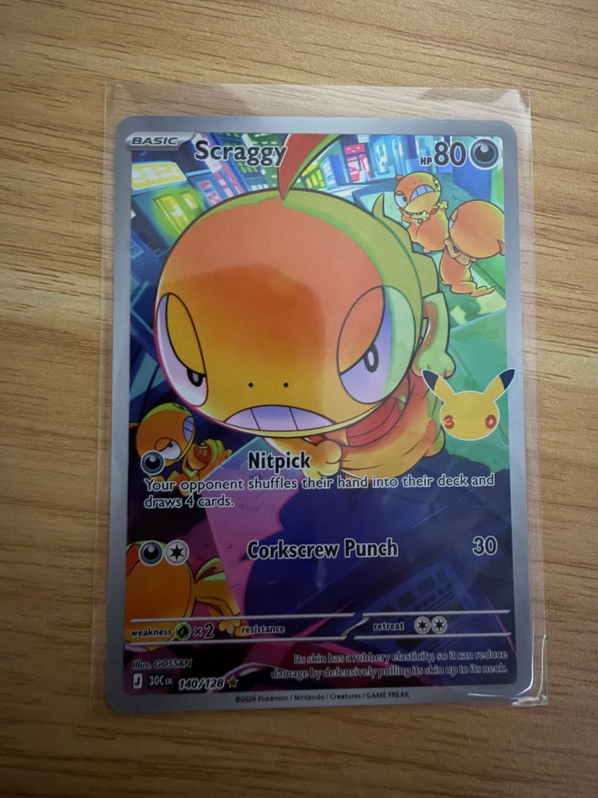 Pokémon Kaart Scraggy 140/128 Celebrations 30th, Ophalen of Verzenden, Nieuw, Losse kaart, Foil