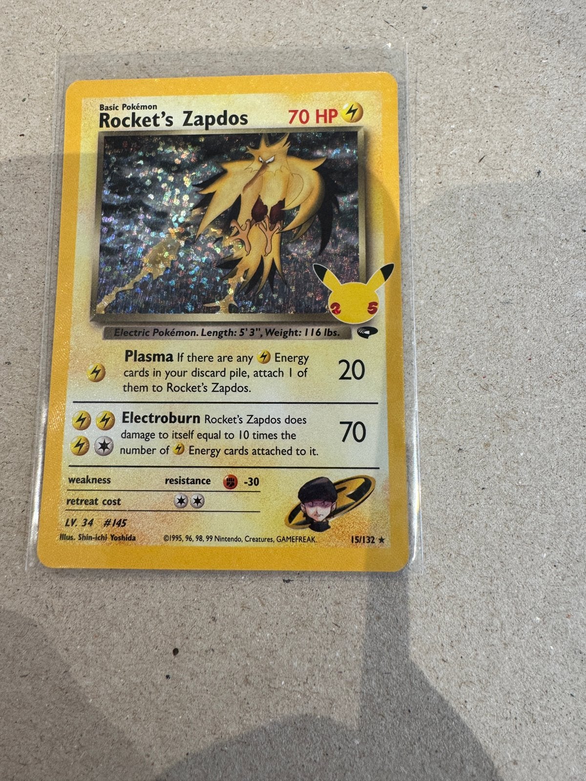 Rocket’s Zapdos 15/132 Celebrations, Hobby en Vrije tijd, Ophalen of Verzenden, Zo goed als nieuw, Losse kaart, Foil