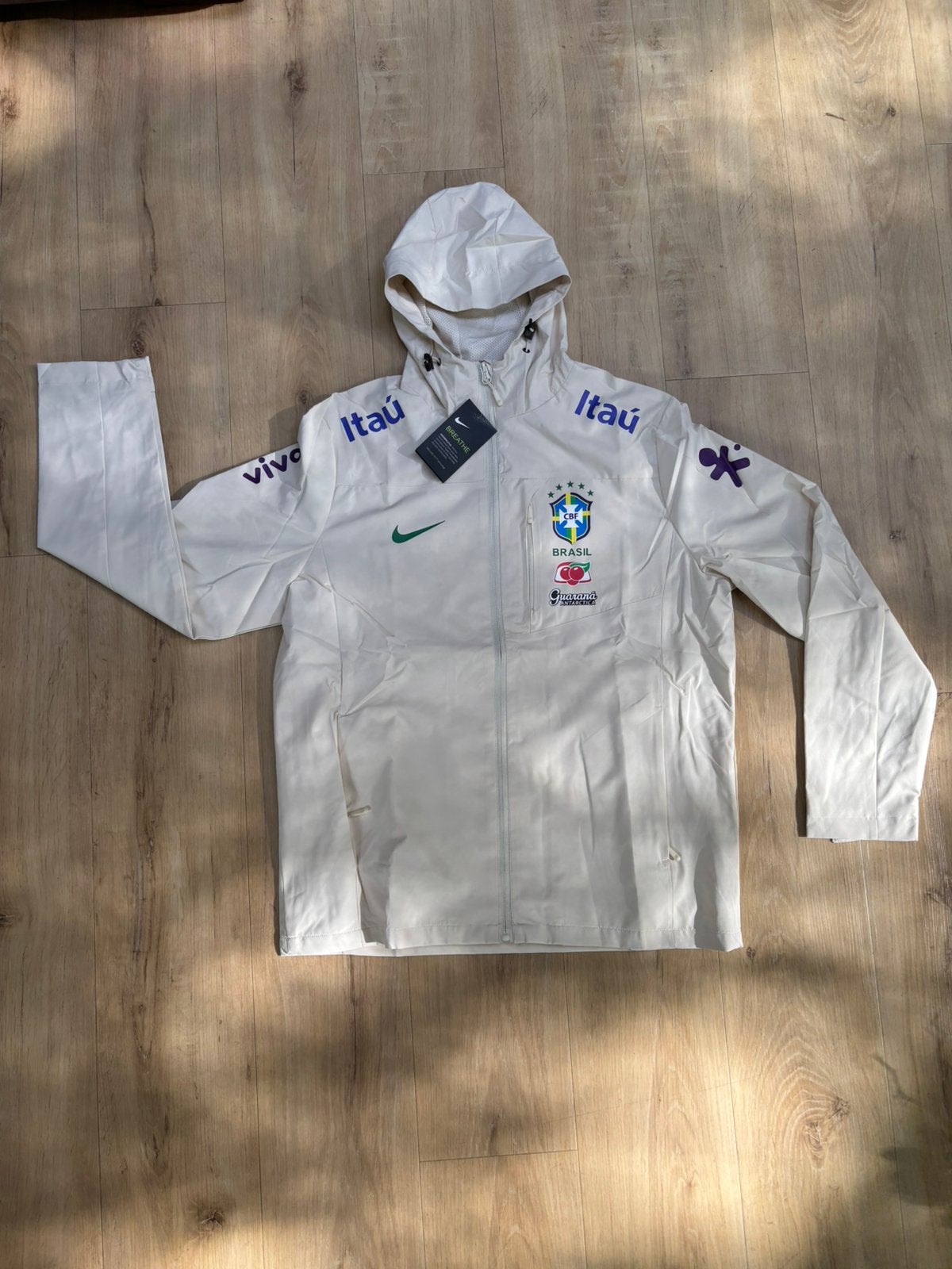 Brazilië Regenjas / Windbreaker - Maat L - Nieuw!, Maat 52/54 (L), Verzenden, Beige, Nieuw