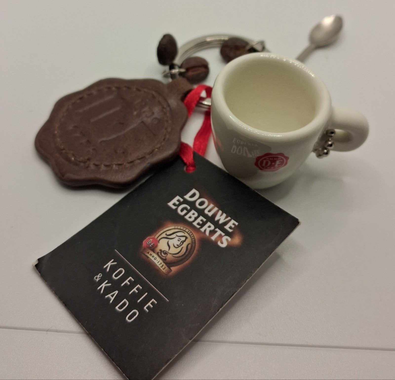 Douwe Egberts sleutelhanger met mini kopje en lepel, Verzamelen, Ophalen of Verzenden, Nieuw