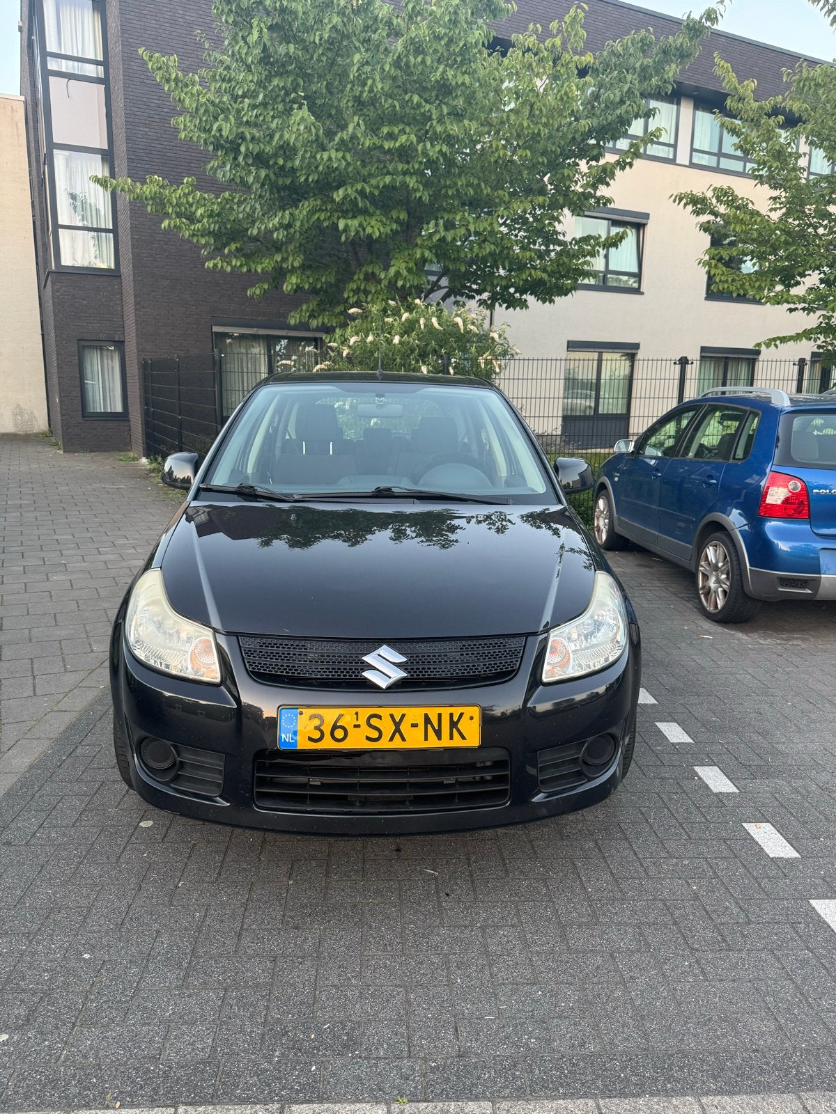 Suzuki SX4 1.6 2006 Zwart, Voorwielaandrijving, 15 km/l, 4 cilinders, Handgeschakeld