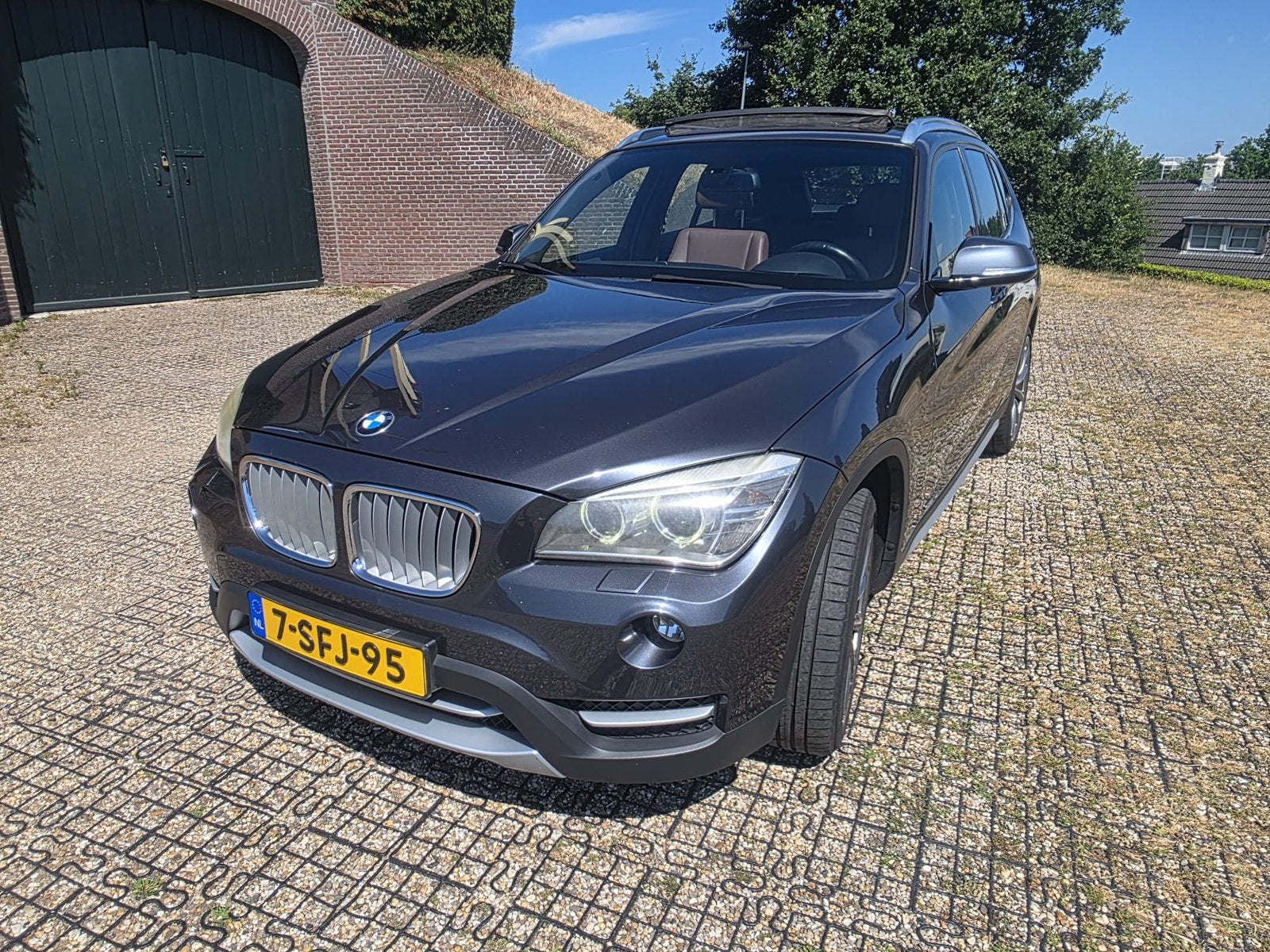 BMW X1 sDrive20i xLine | Panorama | Automaat, Auto's, Achterwielaandrijving, Automatische klimaatregeling, Bruin, Particulier