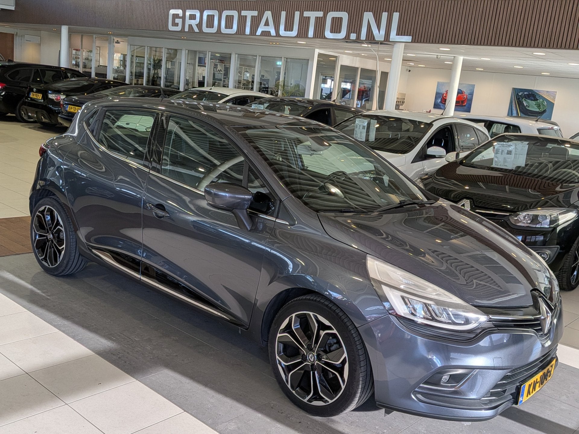 Renault Clio 1.2 TCe Intens Airco, Cruise Control, Stuurbekr, Auto's, Renault, Voorwielaandrijving, Gebruikt, Leder en Stof, 49 €/maand