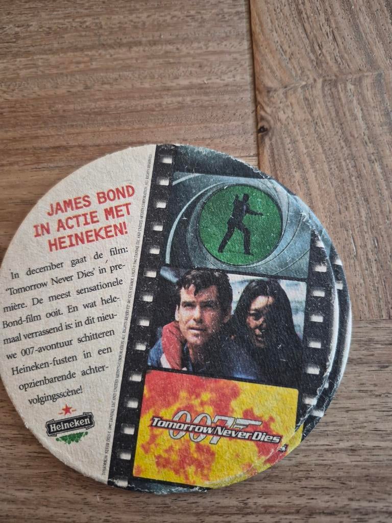 Heineken James Bond Tomorrow Never Dies bierviltje, Ophalen of Verzenden, Gebruikt