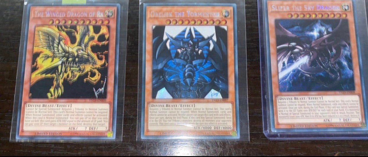 Yu-Gi-Oh! Egyptian God Card Set TN19 Promo !, Ophalen of Verzenden, Zo goed als nieuw, Meerdere kaarten, Foil
