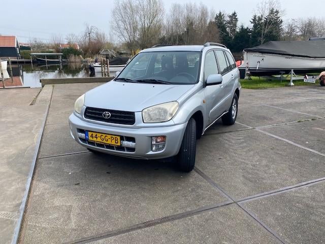 Toyota Rav4 1.8 I 5D 2000 Grijs, Auto's, Toyota, Voorwielaandrijving, Zwart, 4 cilinders, Bedrijf