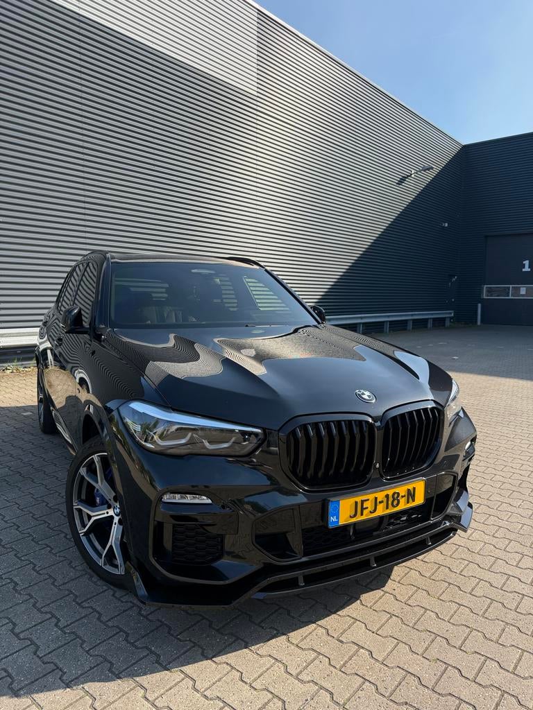 BMW X5 45e M-Sport | Sky Lounge | Massage | Koeling | Pano, Auto's, 404 pk, X5, Parkeerassistent, Zwart
