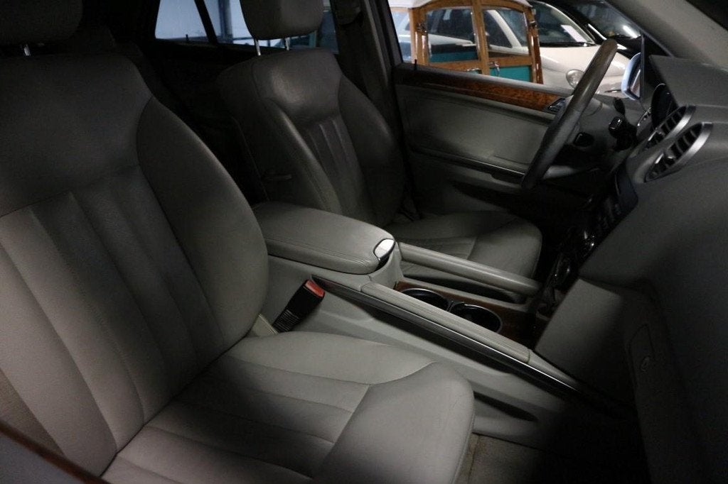Mercedes-Benz M-klasse 350 AUTOMAAT / SCHUIFDAK / KETTING VE, Auto's, Mercedes-Benz, Automaat, Gebruikt, Blauw, Leder