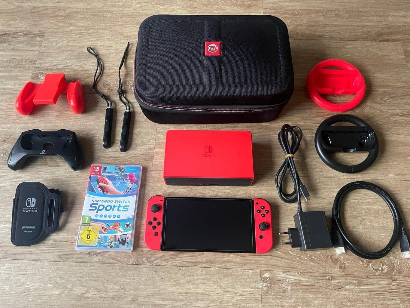 Nintendo Switch OLED Mario Red Edition + Sports + Extra's, Switch OLED, Met games, Met 2 controllers, Ophalen of Verzenden
