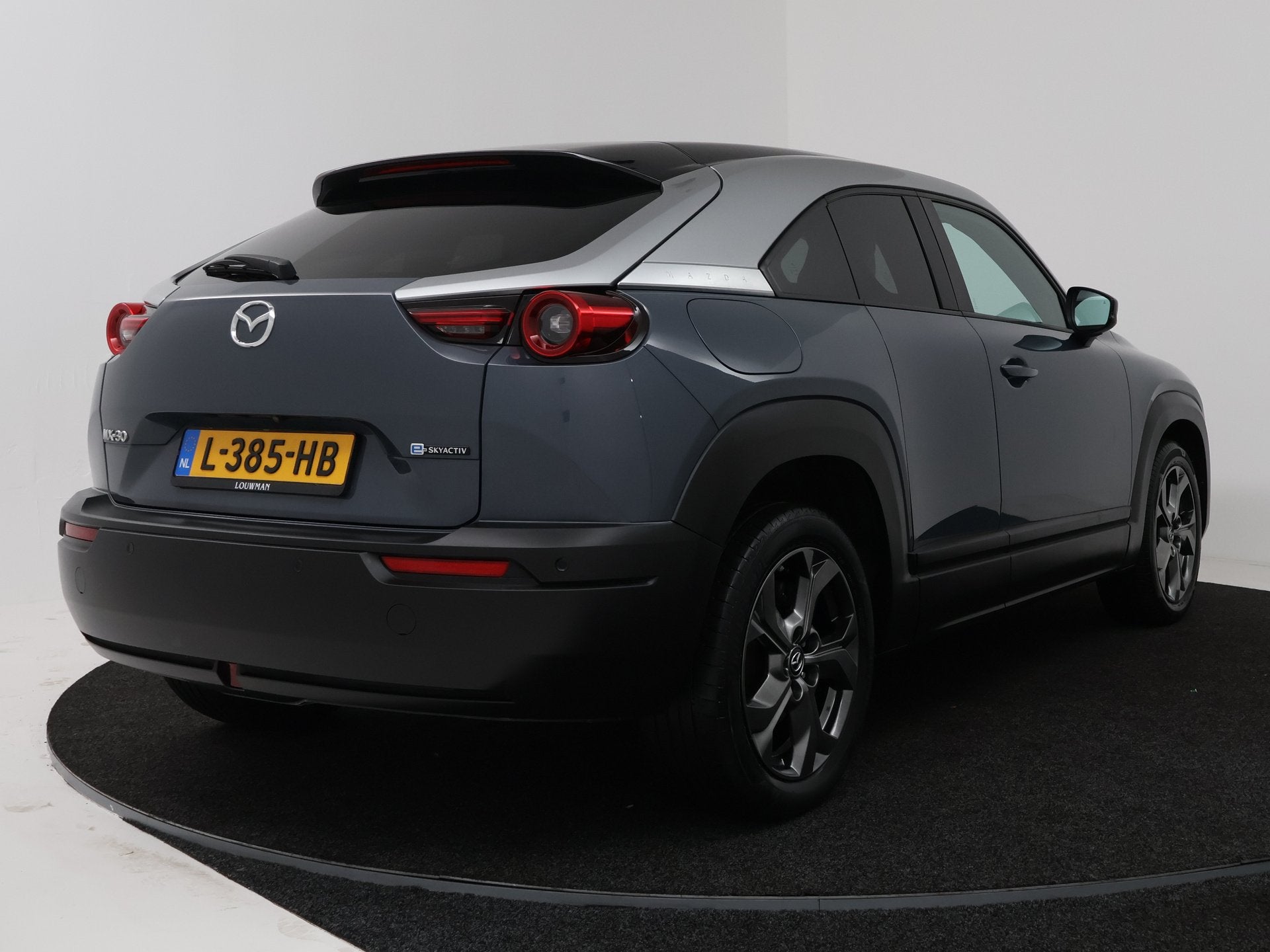 Mazda MX-30 e-SkyActiv 145 First Edition 36 kWh | Stoelgeheu, Auto's, Mazda, Gebruikt, 35 kWh, Leder en Stof, 322 min
