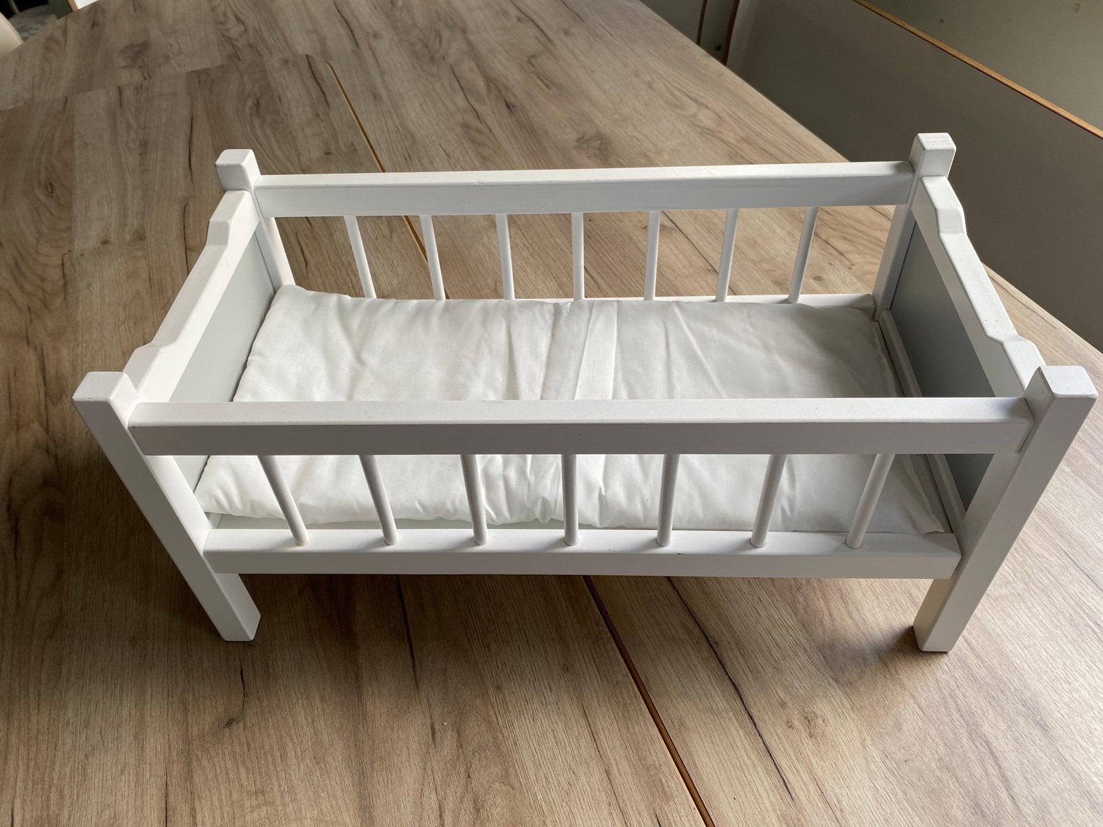 Poppenbed, Ophalen, Babypop