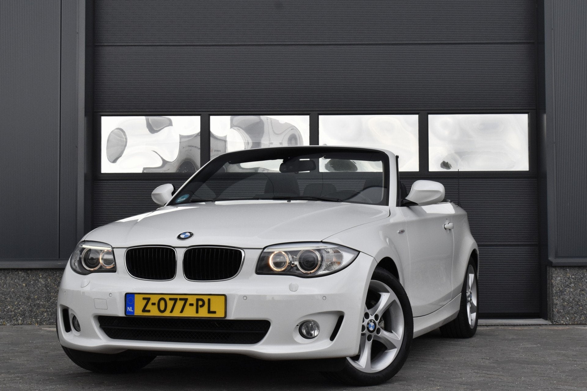 BMW 1-serie 118i High Executive Keyless - Xenon - Navi - Cru, Euro 5, Achterwielaandrijving, Gebruikt, 4 cilinders