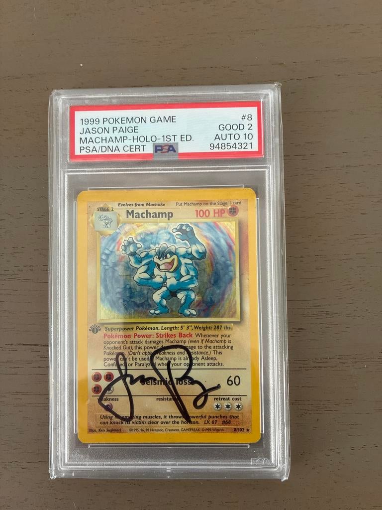 PSA 2 Machamp Holo 1st Edition Autographed Jason Paige, Hobby en Vrije tijd, Verzenden, Zo goed als nieuw, Losse kaart