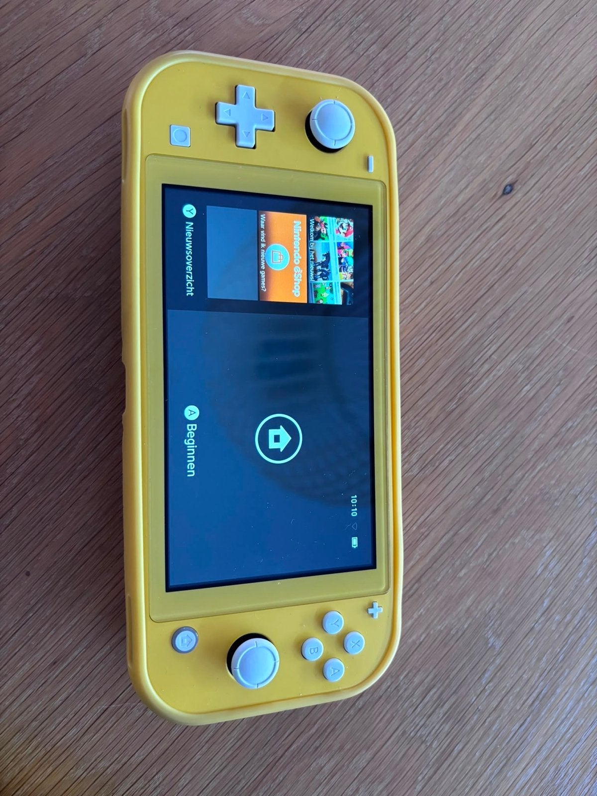 Nintendo Switch Lite Geel met beschermhoes, Spelcomputers en Games, Spelcomputers | Nintendo Switch Lite, Ophalen of Verzenden