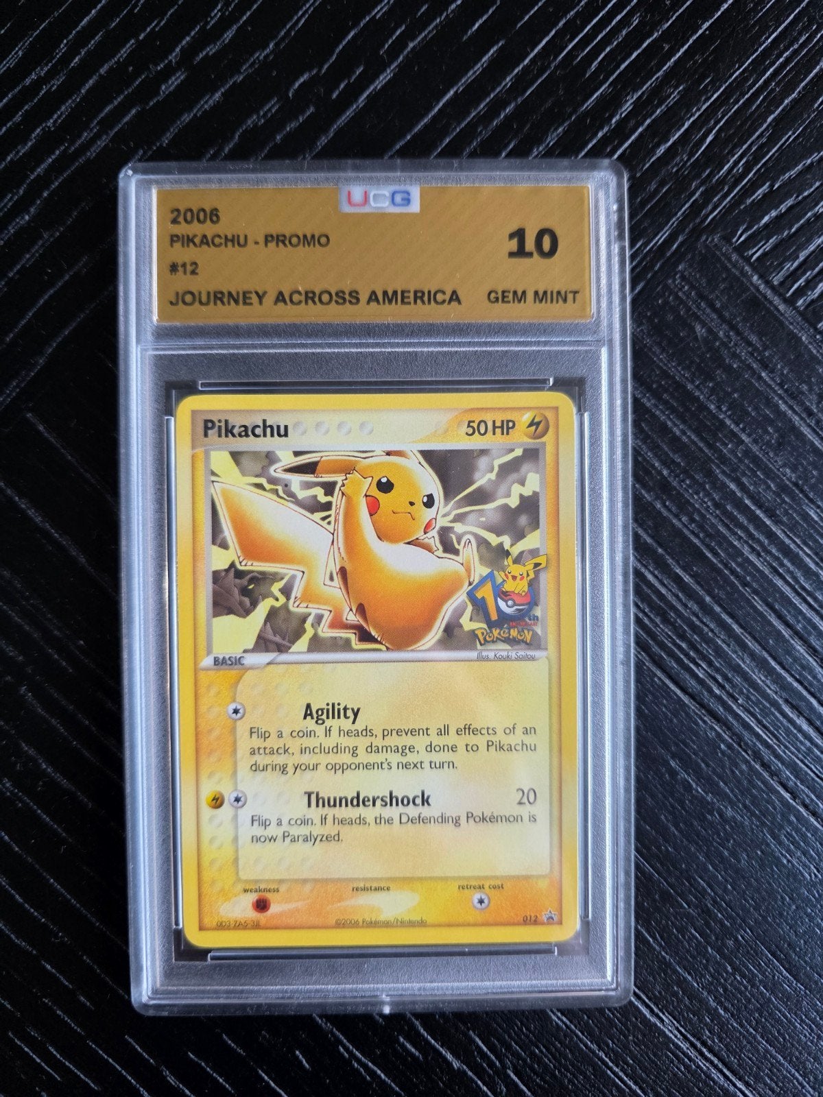 Pokémon Pikachu NP12 Journey across America 10th anniversary, Ophalen, Nieuw, Losse kaart, Foil
