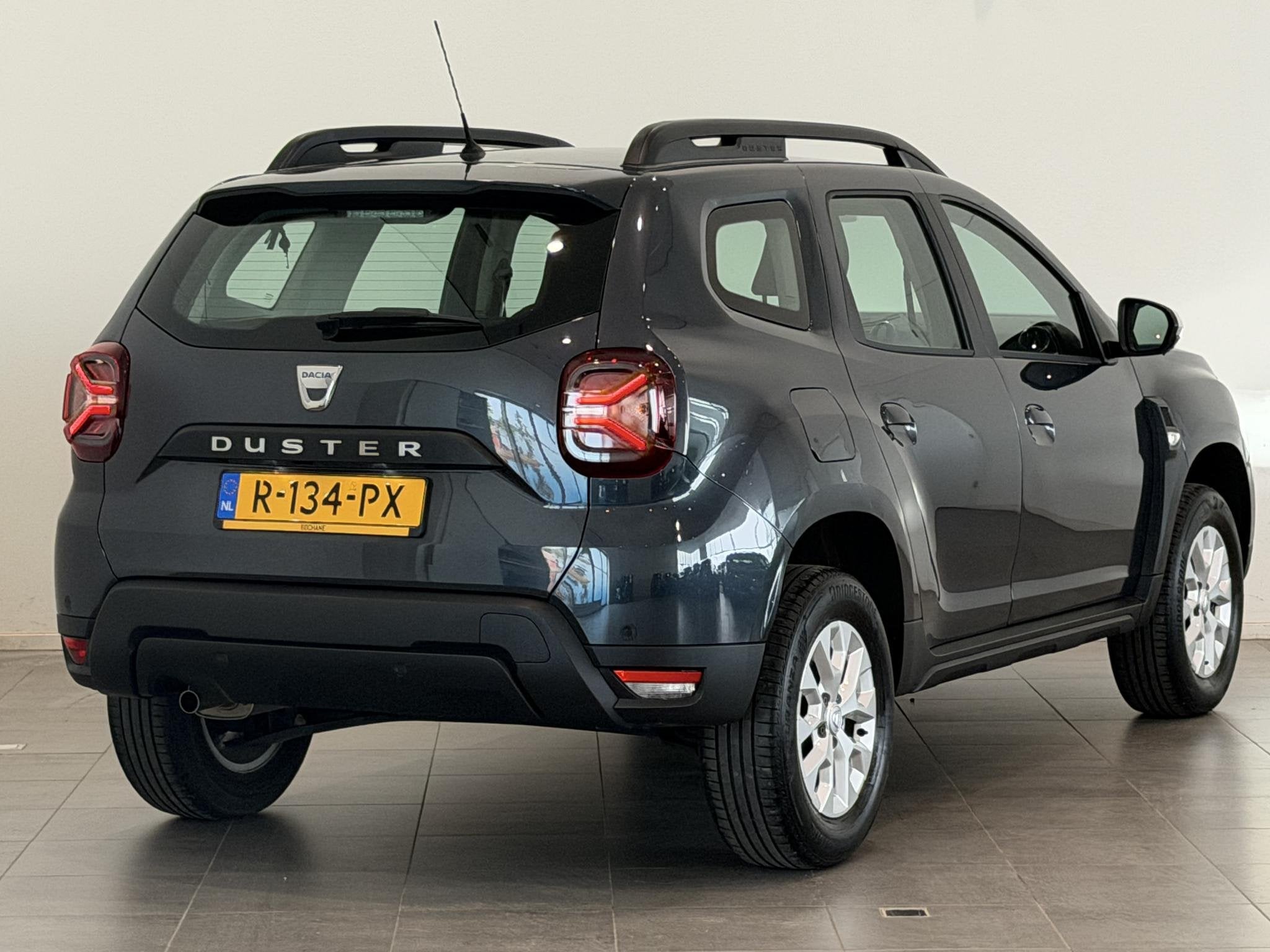 Dacia Duster 1.0 TCe 100 Bi-Fuel Comfort | Airco | Cruise Co, Auto's, Dacia, 1272 kg, Gebruikt, Origineel Nederlands, Handgeschakeld