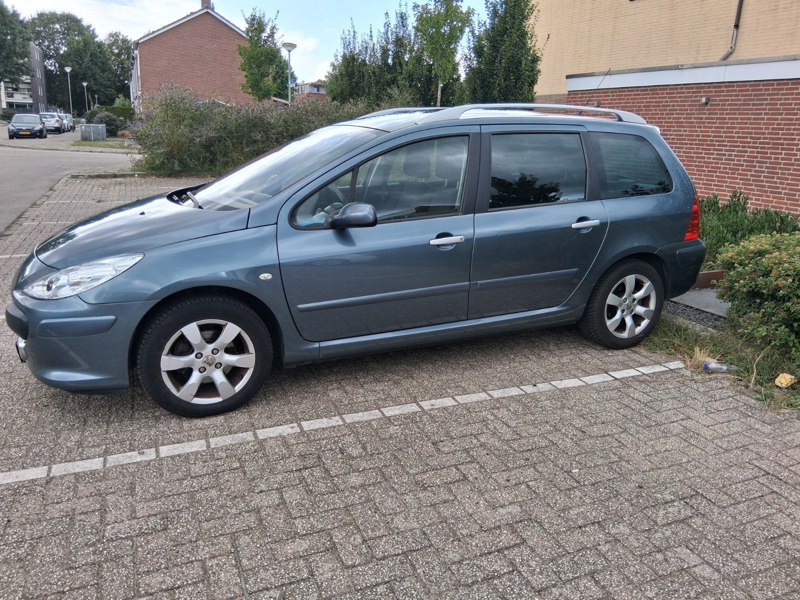 Peugeot 307 2.0 16V SW AUT 2006 Grijs, Auto's, Peugeot, 745 kg, 4 cilinders, 7 stoelen, Origineel Nederlands