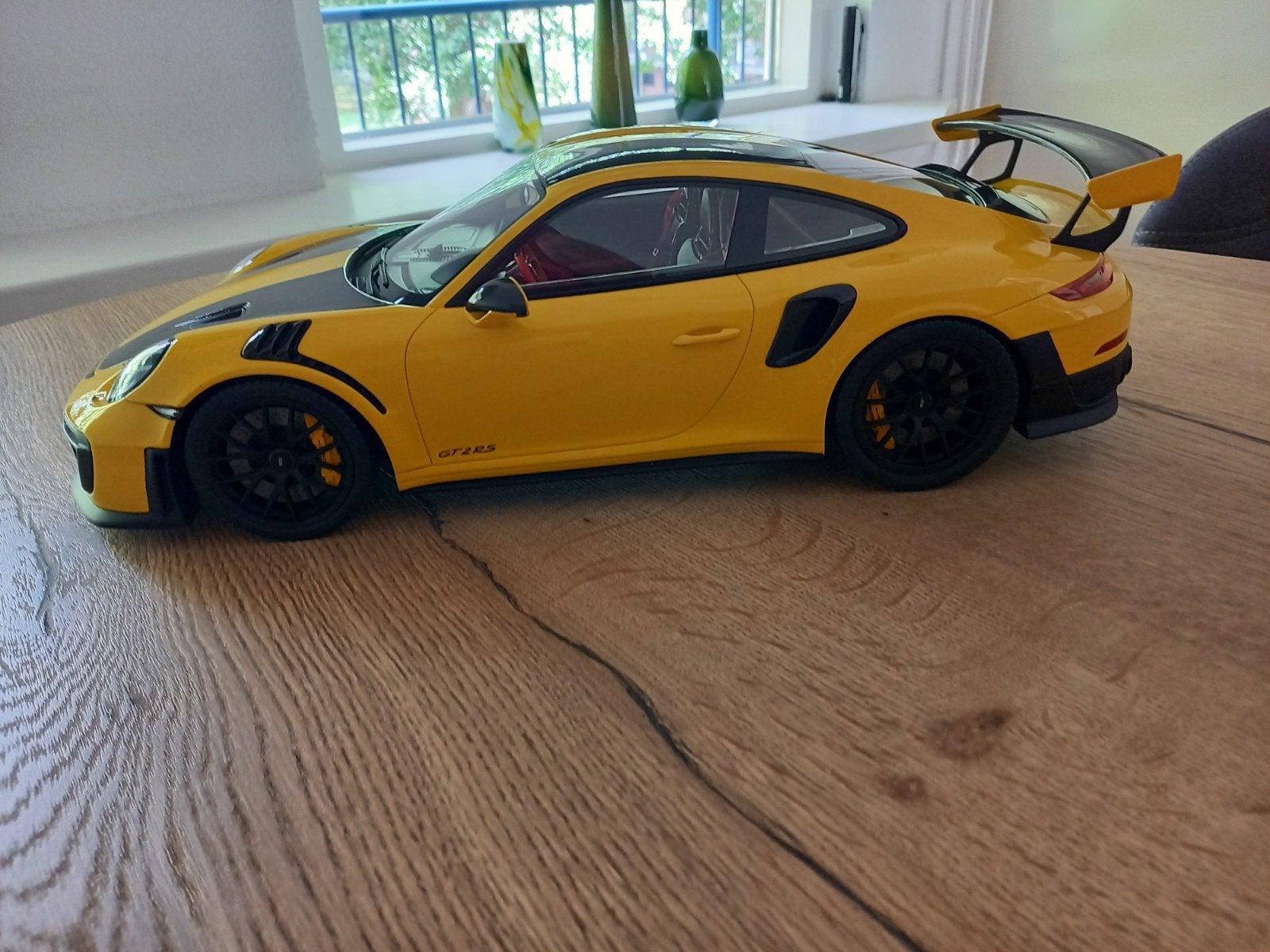 Porsche 911 GT 2 RS geel 1:12, Ophalen, Zo goed als nieuw, 1:9 t/m 1:12, Auto