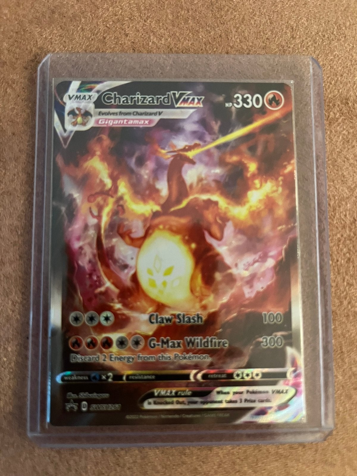 Charizard VMax SWSH261 promo, Ophalen of Verzenden, Zo goed als nieuw