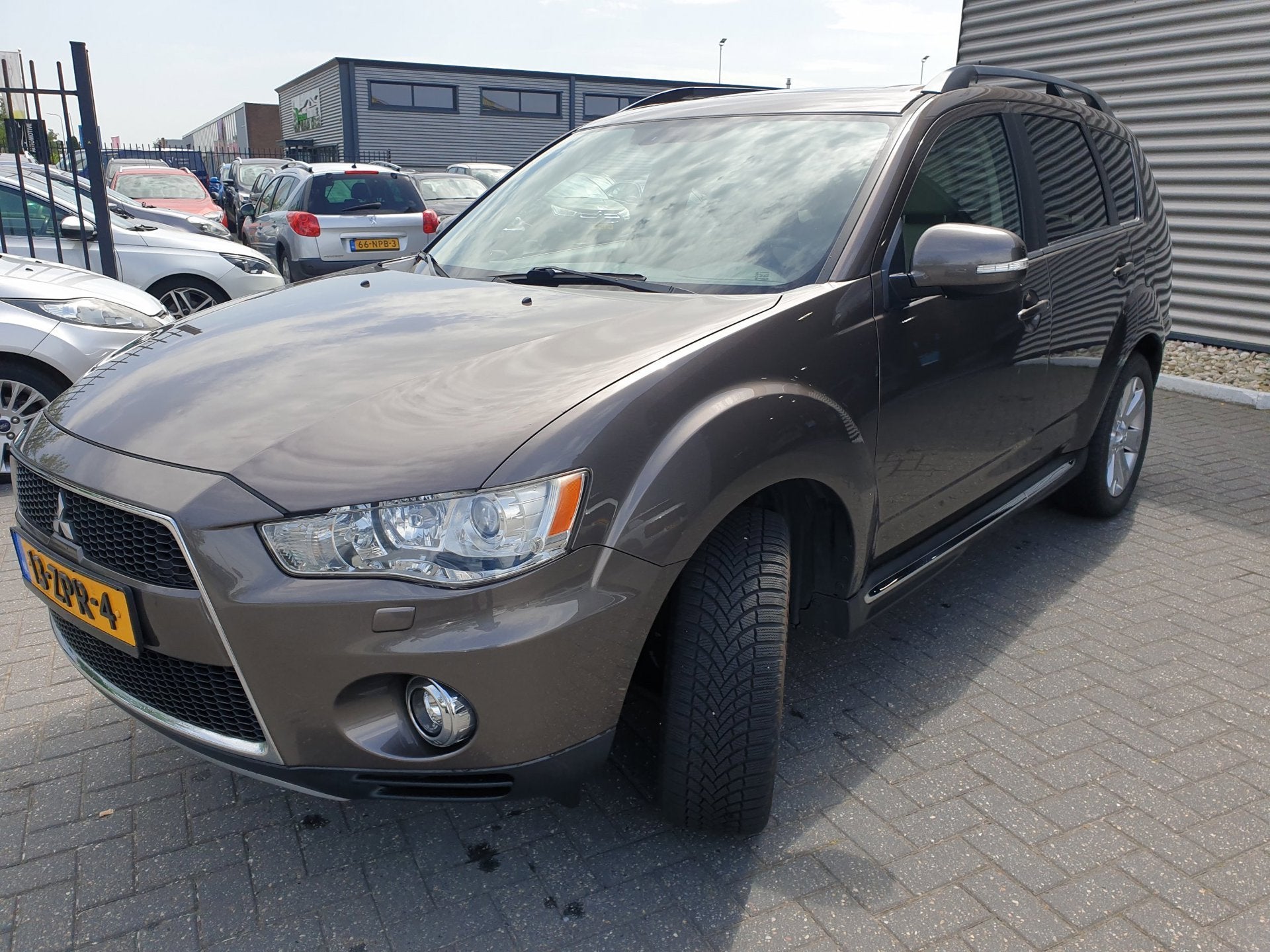 Mitsubishi Outlander 2.0 Edition Two Automaat, Auto's, Beige, 4 cilinders, Bruin, Xenon verlichting