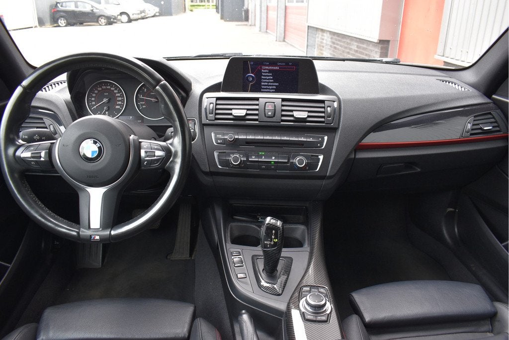 BMW 1-serie 116i Business+ Sport M-stuur, Sport stoelen Auto, Auto's, BMW, Euro 5, 4 cilinders, Zwart, 1598 cc