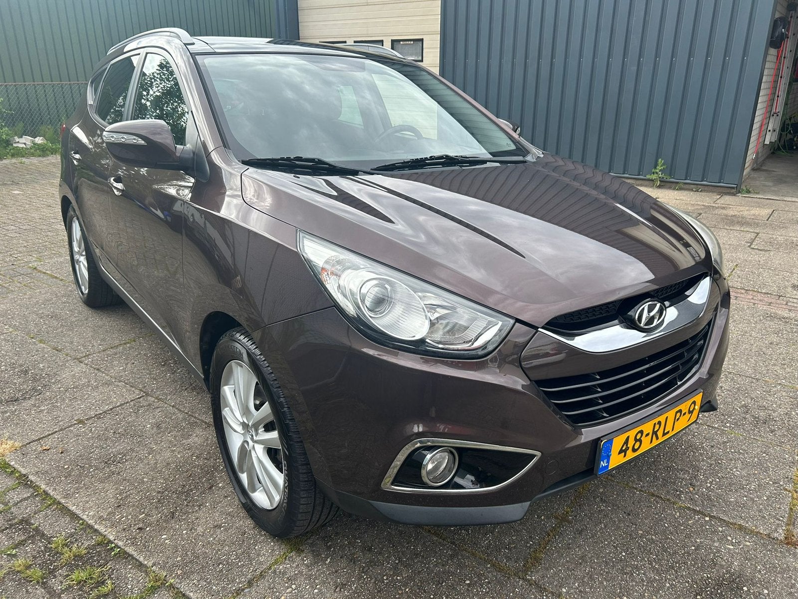 Hyundai iX35 2.0 I Cvvt 4WD!! AUT 2011 Bruin, Auto's, Hyundai, 1998 cc, Zwart, 4 cilinders, Bruin