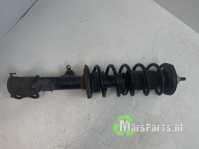 Schokdemperpoot links-voor van een Nissan Micra, Gebruikt, -, -, Ophalen of Verzenden
