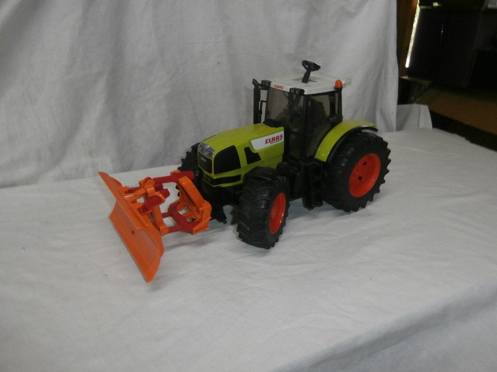 Bruder Claas Atlas 936 RZ trekkers met werktuigen, Ophalen, Gebruikt