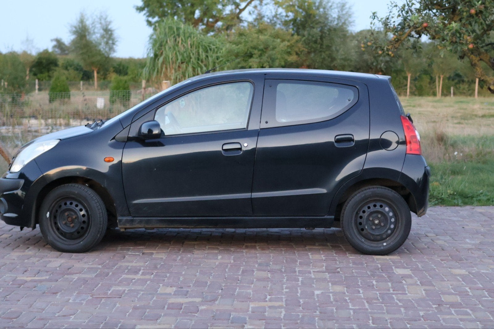 Nissan Pixo 1.0 50KW 5D 2009 Zwart, Voorwielaandrijving, 200 kg, 4 stoelen, Origineel Nederlands
