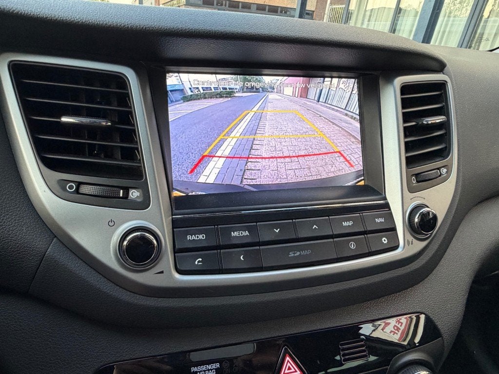 Hyundai TUCSON 1.6 GDi Comfort TOP CONDITIE VEEL OPTIES NAP, Auto's, Voorwielaandrijving, Gebruikt, 4 cilinders, 132 pk