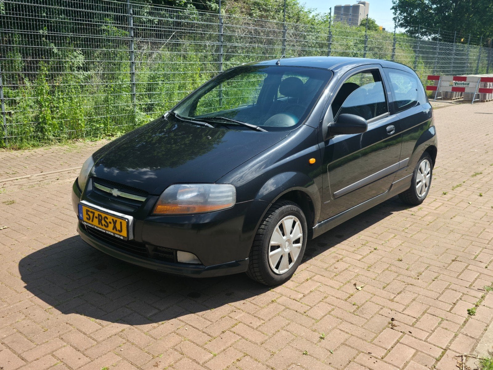 Chevrolet Kalos 1.4 16V 3D AUT 2005 Zwart, Auto's, Chevrolet, 40 €/maand, 4 cilinders, Zwart, Origineel Nederlands