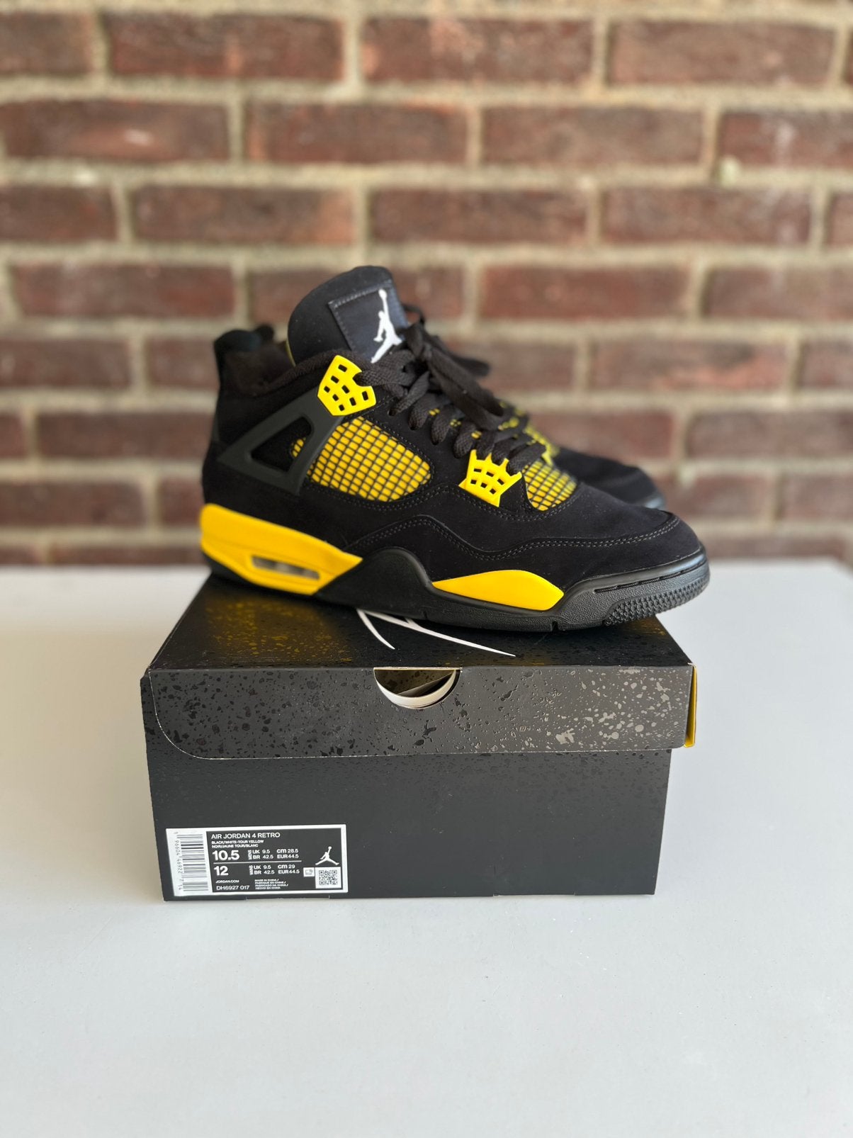 Nike Air Jordan 4 Thunder, Zwart, Ophalen of Verzenden, Sneakers of Gympen, Zo goed als nieuw