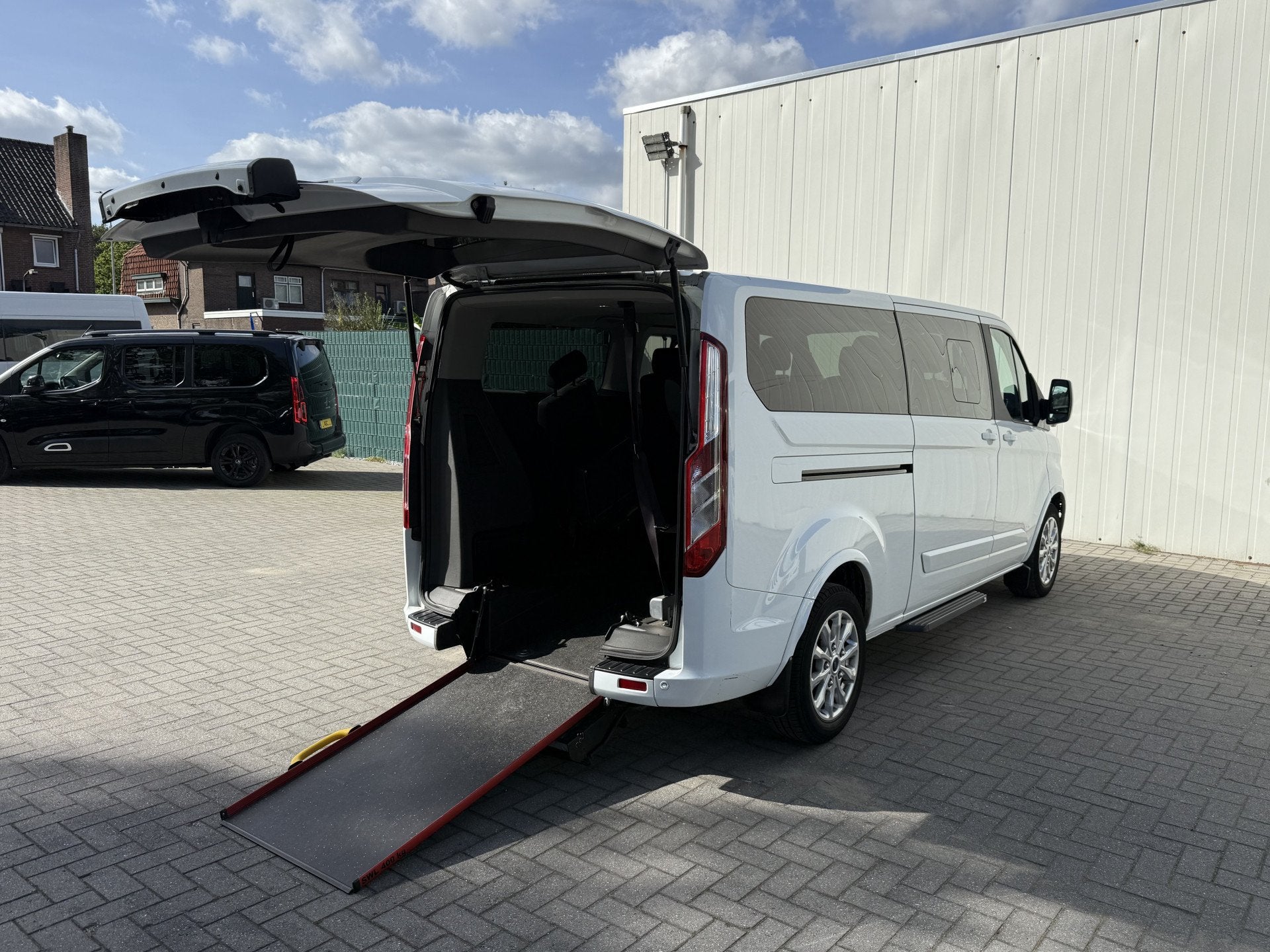 Ford Transit Custom 2.0 TDCI L2H1 Rolstoelbus - Automaat - B, Auto's, Dealer onderhouden, Gebruikt, 4 cilinders, 2212 kg