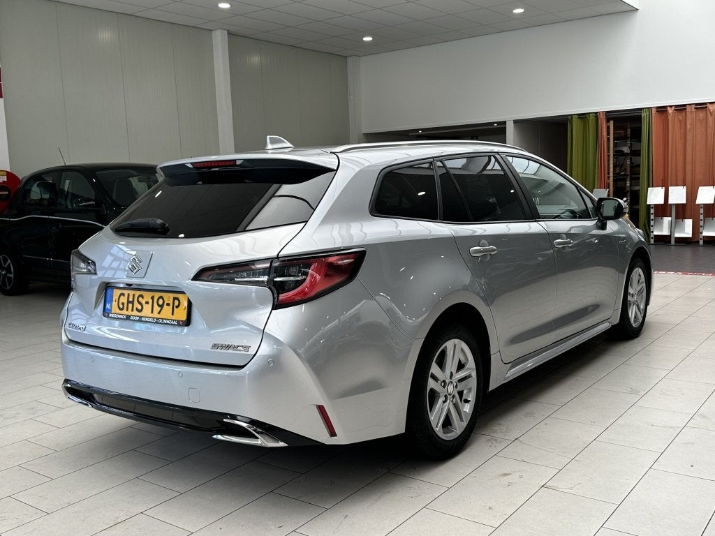 Suzuki Swace 1.8 Hybrid Style [ ALL SEASON I CLIMA I STOEL/, Auto's, Automaat, Gebruikt, 4 cilinders, Hybride Elektrisch/Benzine