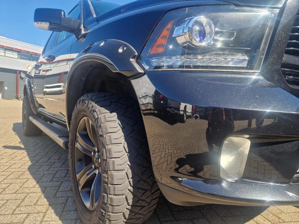 Dodge RAM 1500 SPORT , full options, €27.850 ex BTW, Automaat, 5654 cc, Met garantie (alle), Zwart