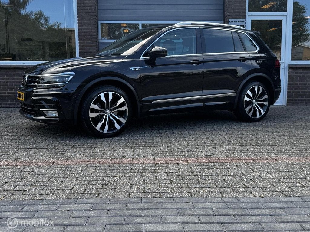 Volkswagen Tiguan 2.0 TSI 4WD R LINE DSG UNIEK! ALLE OPTIES!, Auto's, Volkswagen, Automaat, Gebruikt, Euro 6, 4 cilinders