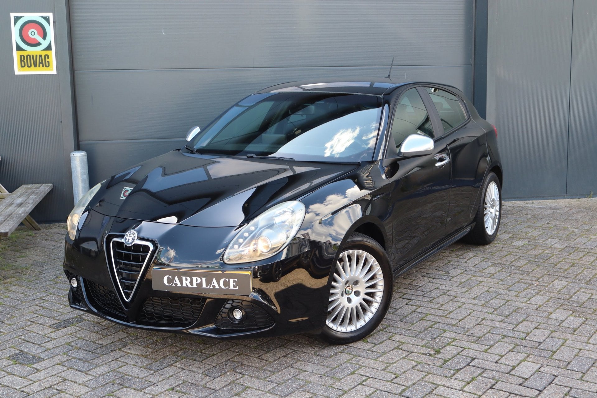Alfa Romeo Giulietta 1.4 T Distinctive-Automaat-Clima, Auto's, Alfa Romeo, Euro 5, Zwart, 4 cilinders, Zwart