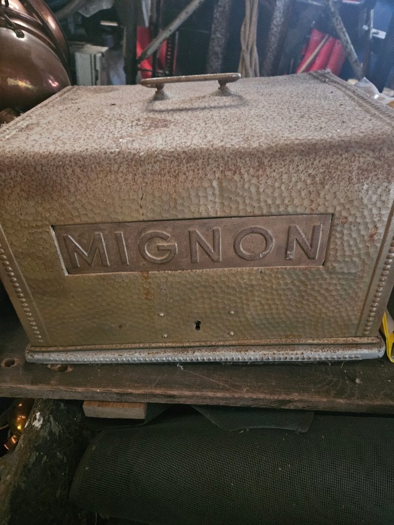 Mignon naaimachine, Ophalen