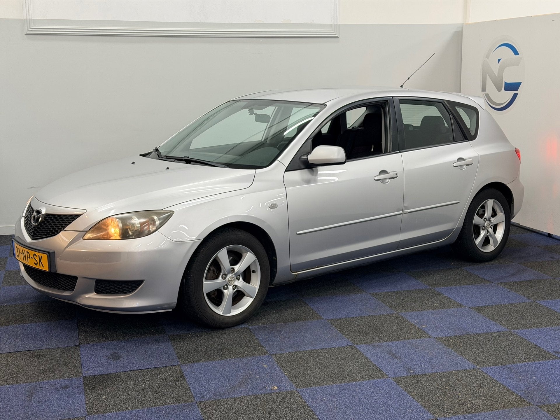 Mazda 3 Sport 1.6 Touring / AUTOMAAT / AIRCO / NAP, Dealer onderhouden, Gebruikt, 4 cilinders, Origineel Nederlands